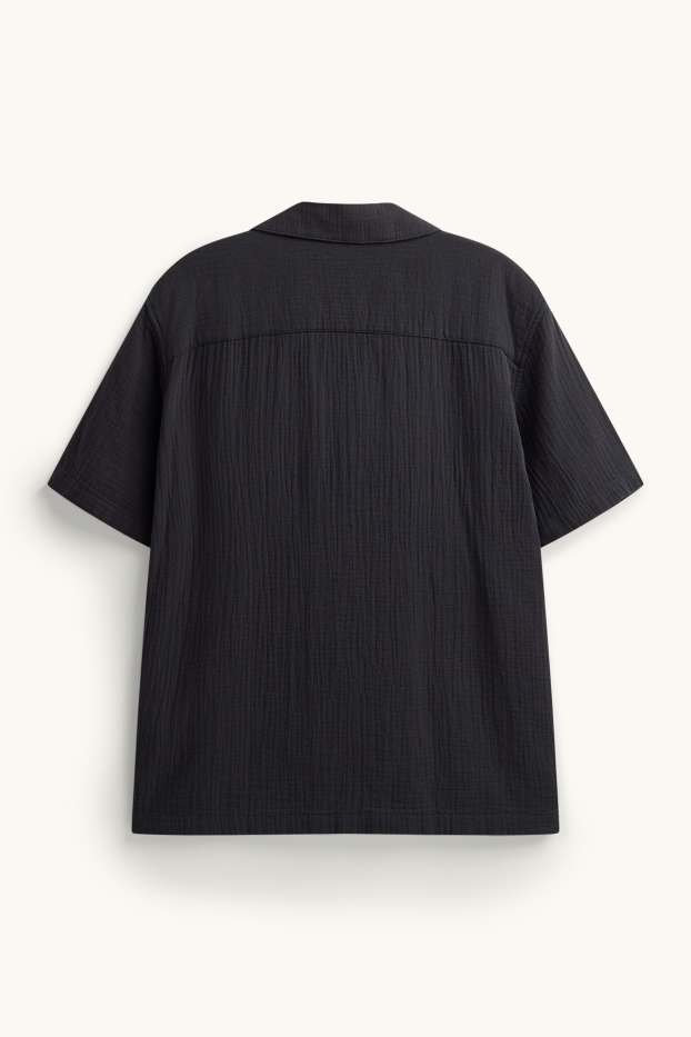 Home - Camisa - relaxed fit - coll solapa - negre