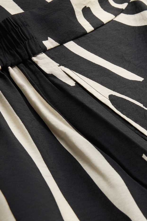 Femmes - Pantalon en toile - high waist - wide leg - à motif - noir / blanc