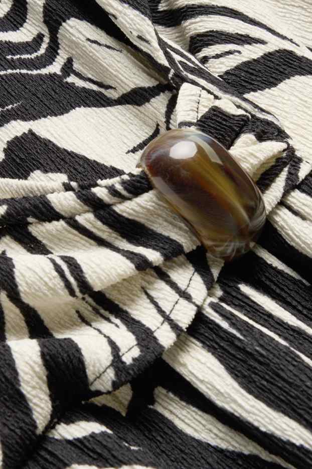 Dames - Fit & flare-jurk met V-hals - met patroon - wit / zwart