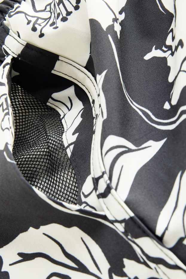 Dames - Bikinishort - LYCRA® - gebloemd - zwart / wit