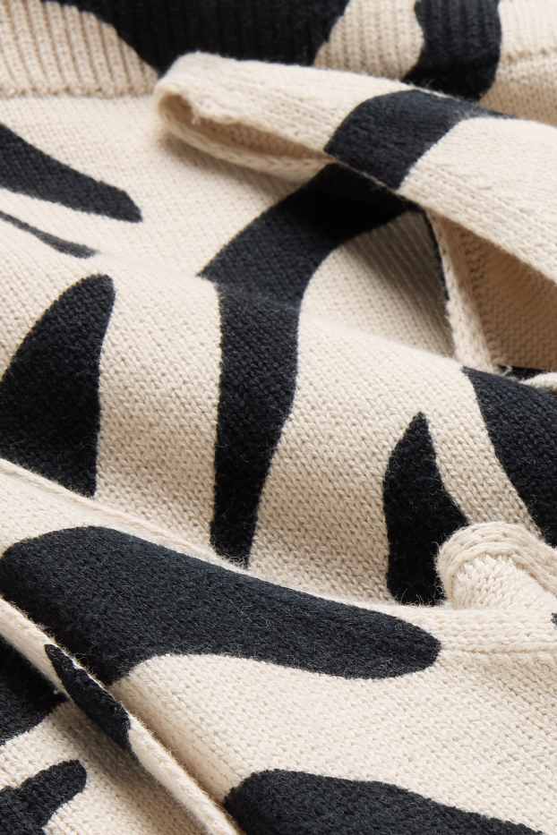 Femei - Top tricotat cu decolteu în V - cu model - negru / nej