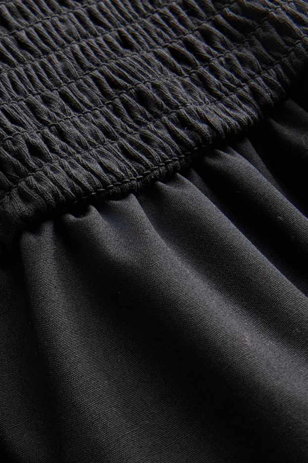 Femmes - Robe fit & flare - finition smockée - noir