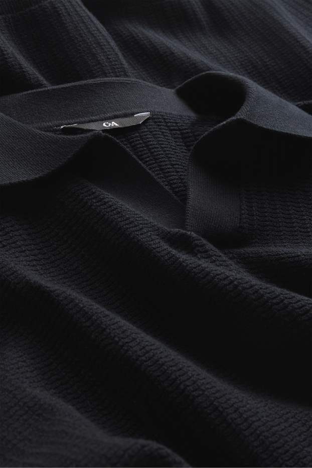 Heren - Gebreid poloshirt - relaxed fit - met structuur - zwart