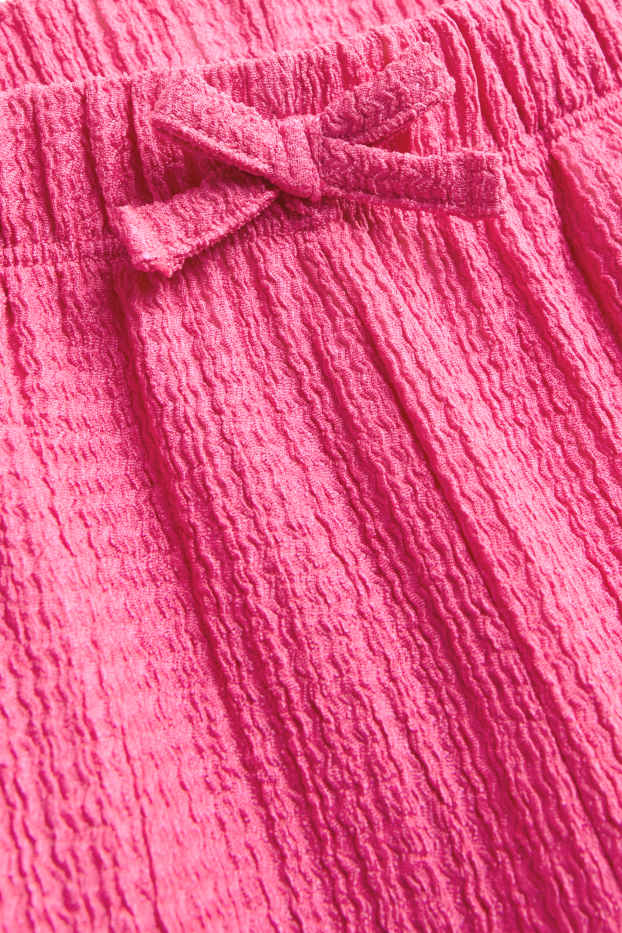 Enfants filles - Pantalon en toile - finition texturée - rose