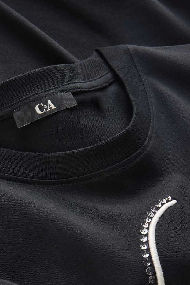 Dames - T-shirt - regular fit - glanseffect - zwart