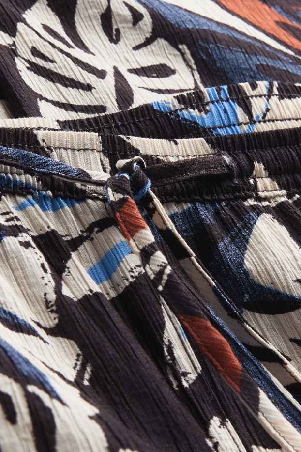 Femmes - Pantalon en toile - mid waist - wide leg - à motif - noir