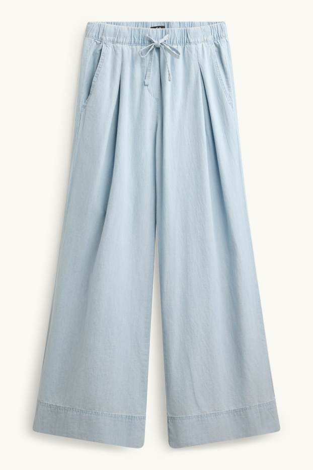 Dona - Pantalons de tela - mid waist - palazzo - blau clar