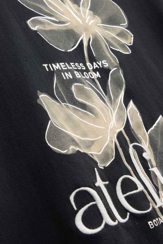 Femmes - T-shirt - regular fit - effet brillant - noir