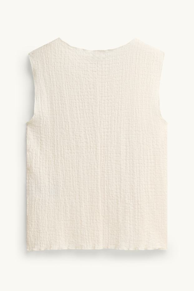 Femmes - Caraco - finition texturée - blanc crème