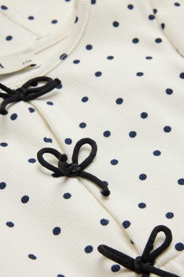 Kinder Mädchen - Punkte - Set - Kurzarmshirt und Flared Leggings - 2 teilig - weiß / schwarz