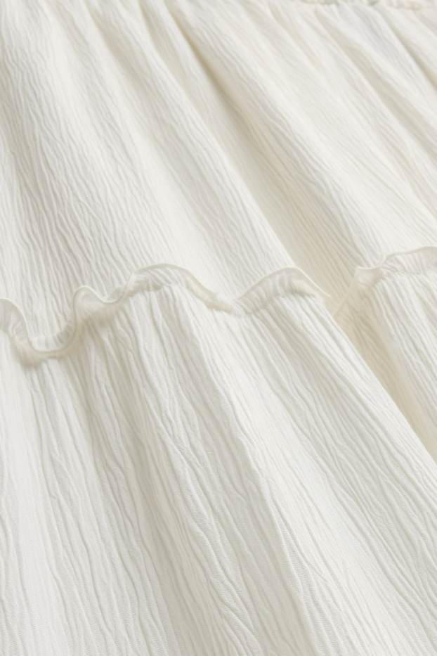 Femmes - Jupe - finition texturée - blanc