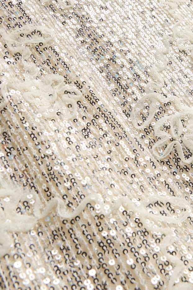 Dona - Faldilla amb lluentons - daurat