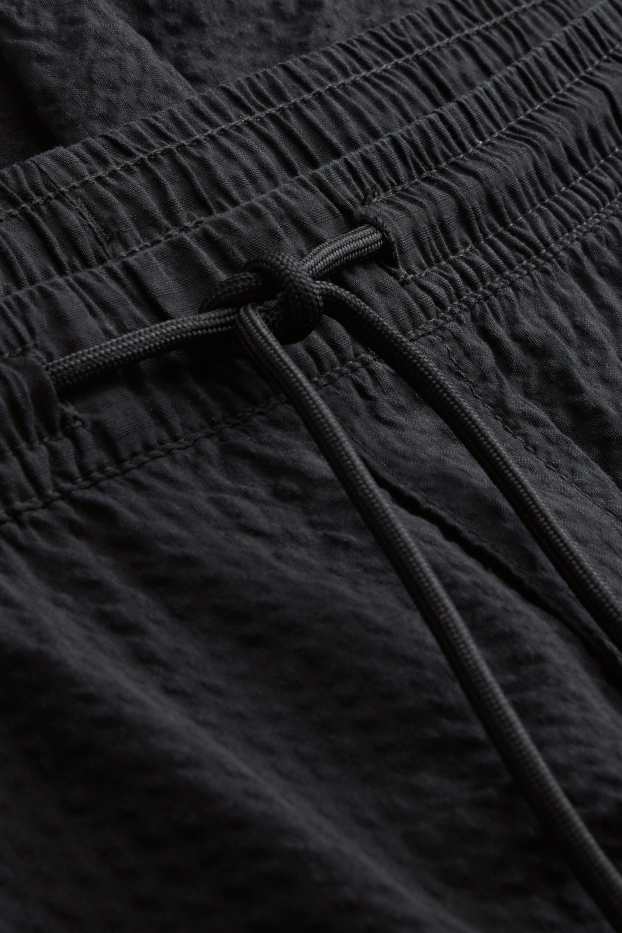 Hommes - Short - finition texturée - noir