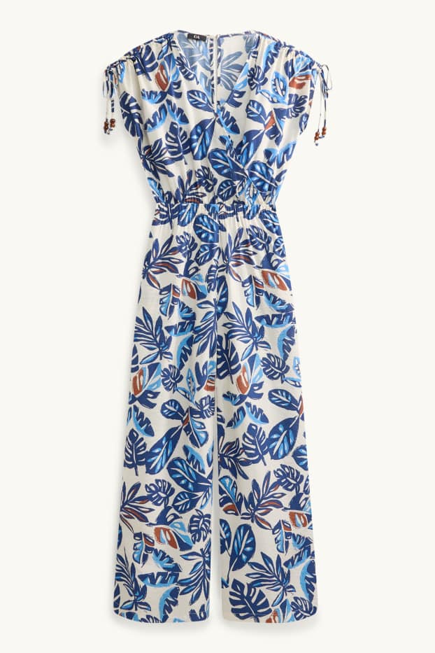 Damen - Jumpsuit mit V-Ausschnitt und Perlen - gemustert - blau / weiss