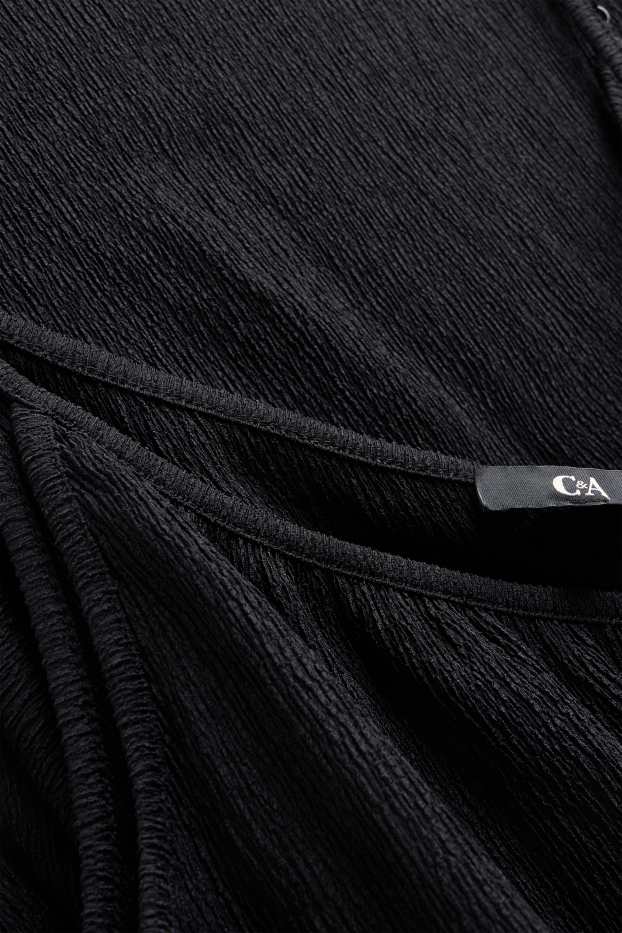 Dona - Granota amb cinturó - texturada - negre