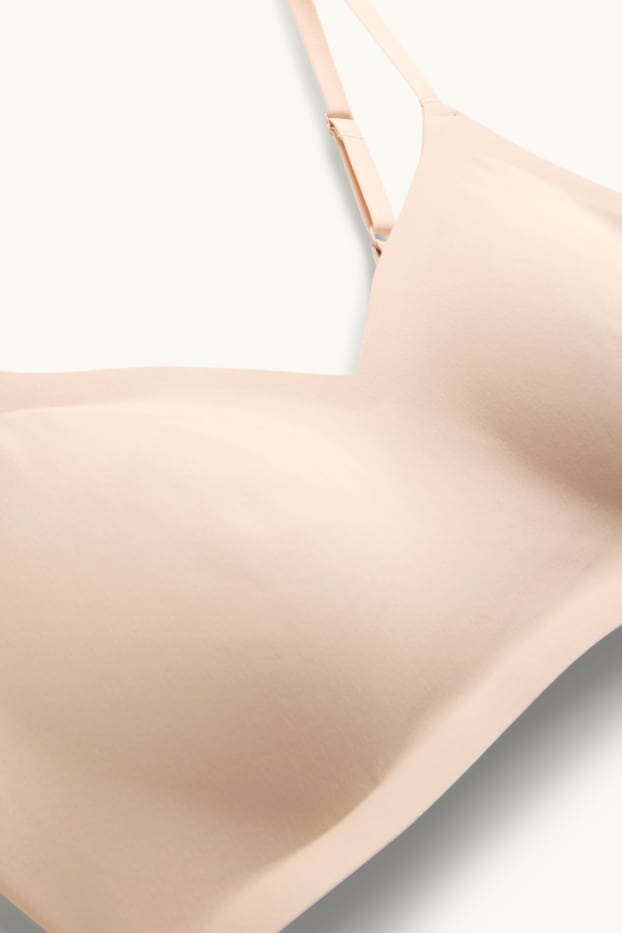 Dona - Sostenidors invisibles sense cèrcols - enconxats - beix