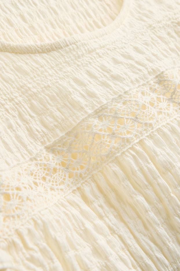 Dames - T-shirt - regular fit - met structuur - crème wit