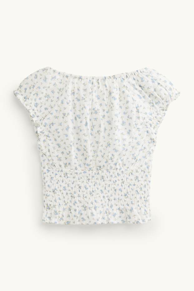 Femei - Bluză crop fără mâneci - cu flori - cu fronseuri - alb