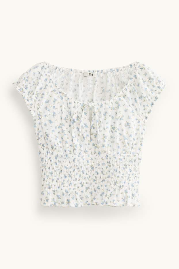 Femei - Bluză crop fără mâneci - cu flori - cu fronseuri - alb