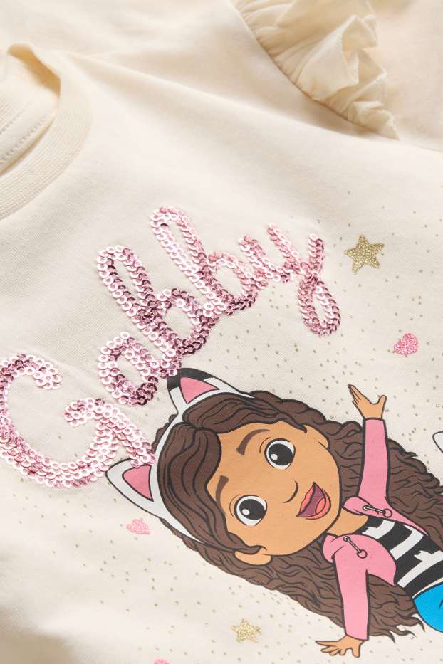 Nena - Casa de Nines de la Gaby - samarreta de màniga llarga - efecte brillant - crema