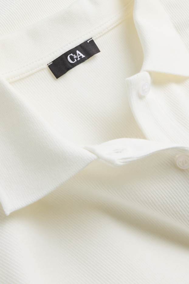 Dona - Polo - regular fit - acanalat - blanc