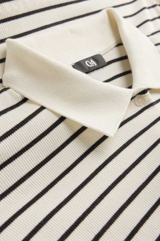 Dames - Gebreid poloshirt - regular fit - gestreept - wit / zwart
