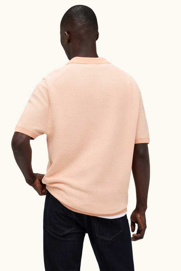Heren - Gebreid poloshirt - relaxed fit - met structuur - oranje