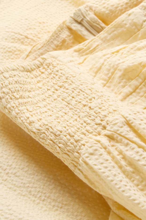 Dona - Minifaldilla - texturada - groc clar