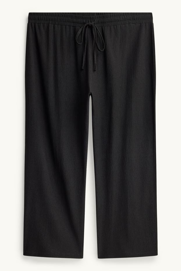 Femmes - Pantalon en jersey - mid waist - wide leg - finition texturée - noir