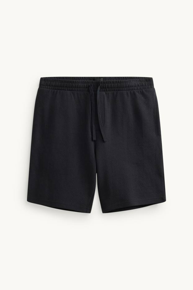 Uomo - Shorts di felpa - tessuto tramato - nero