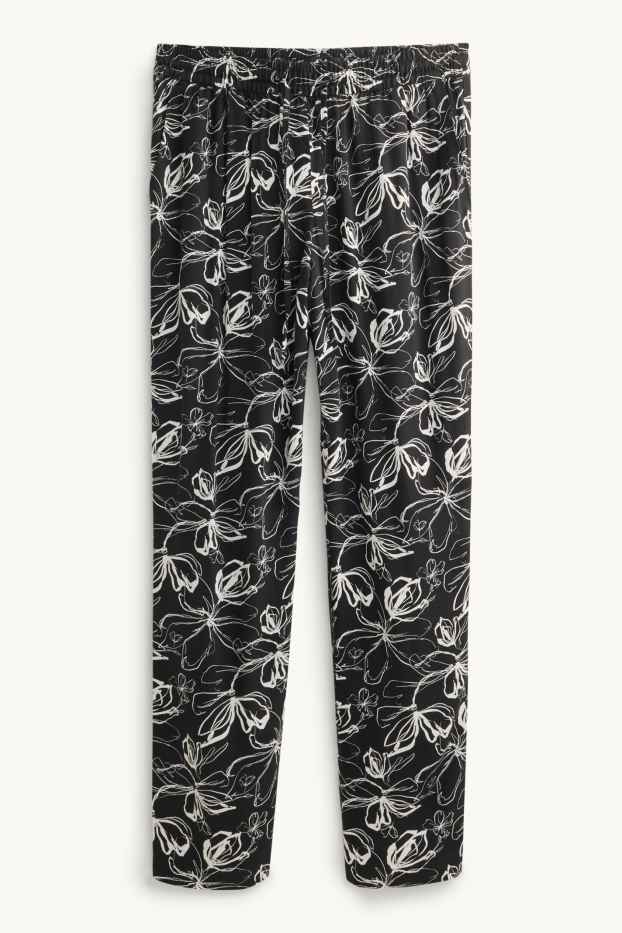 Donna - Pantaloni - vita media - tapered fit - a fiori - bianco / nero