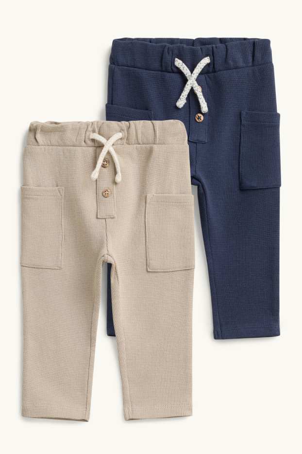 Baby: jongens - Set van 2 - babyjoggingbroek - met structuur - blauw / beige