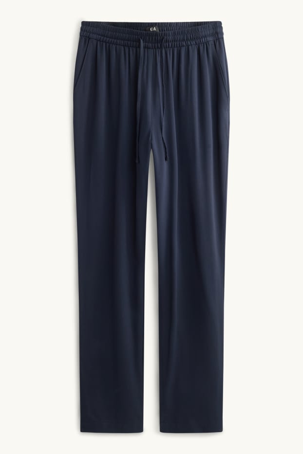 Dona - Pantalons de tela - mid waist - tapered fit - blau fosc