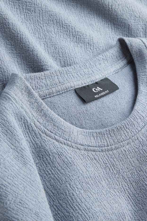 Mężczyźni - T-shirt - relaxed fit - niebieski