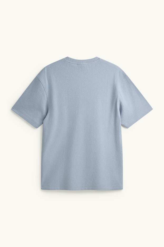 Mężczyźni - T-shirt - relaxed fit - niebieski