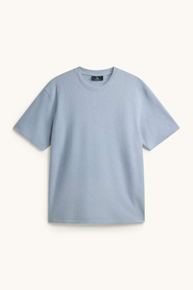 Mężczyźni - T-shirt - relaxed fit - niebieski