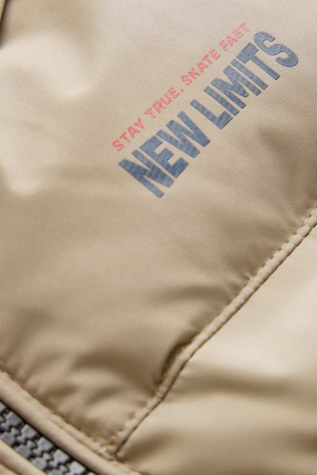 Kinder Buben - Steppweste mit Kapuze - wasserabweisend - beige