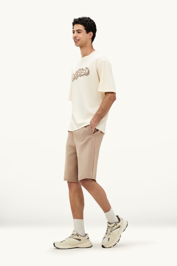 Hommes - Short en molleton - beige
