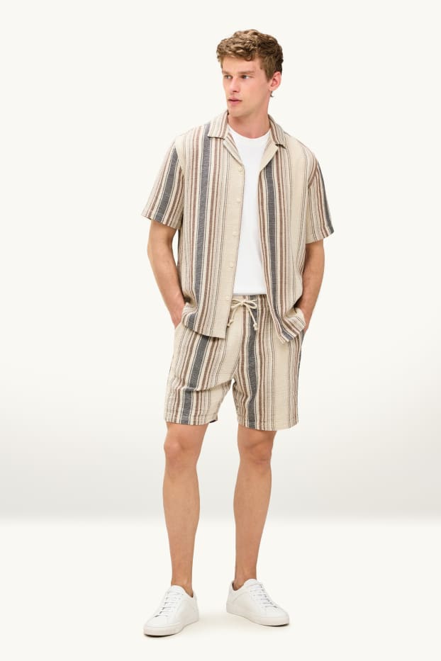 Hommes - Short en molleton - à rayures - texturé - beige