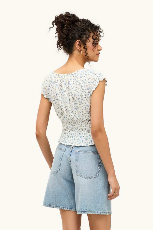 Femmes - Caraco court - à fleurs - smocké - blanc