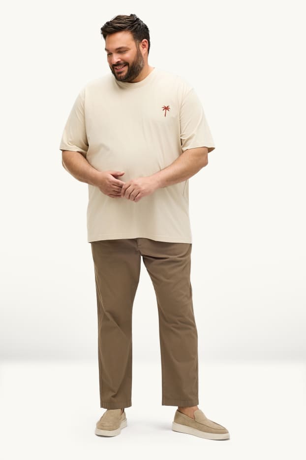 Hommes - Chino - tapered fit - finition texturée - marron