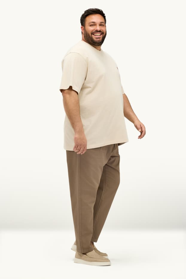 Hommes - Chino - tapered fit - finition texturée - marron