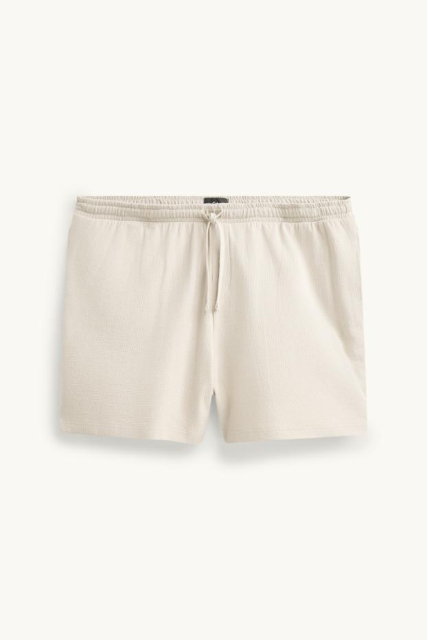 Uomo - Shorts in felpa - tessuto tramato - bianco crema