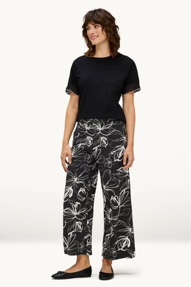 Dames - Korte pantalon - high waist - palazzo - gebloemd - wit / zwart