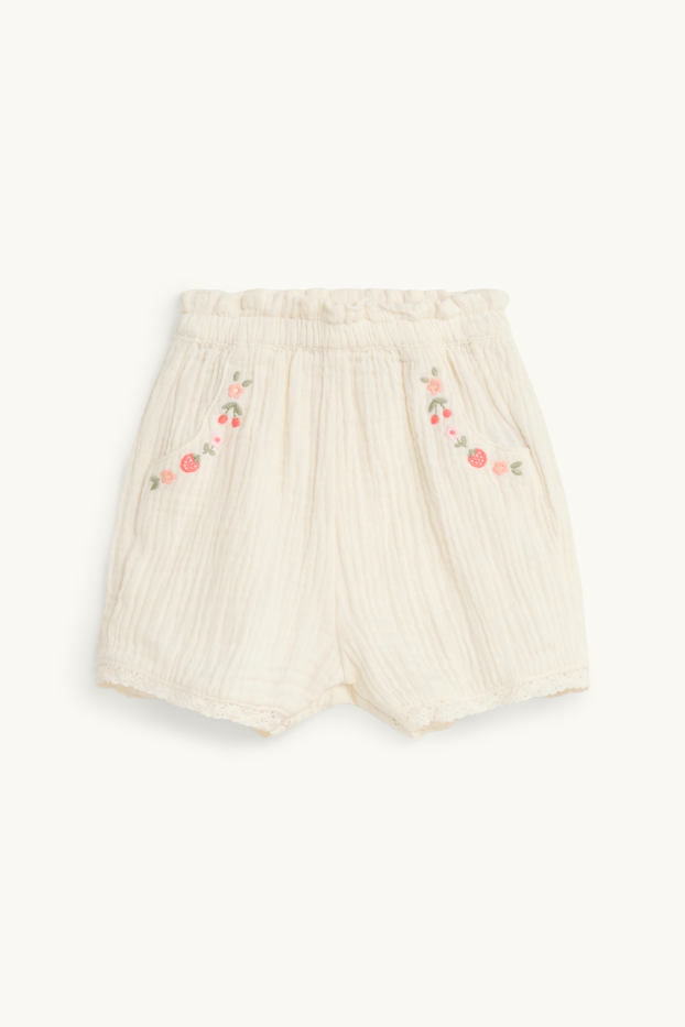 Baby: meisjes - Bloemetjes - mousseline babyshort - crèmekleurig