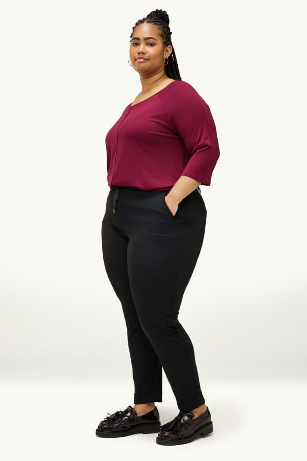Femmes - Pantalon en toile - mid waist - tapered fit - noir