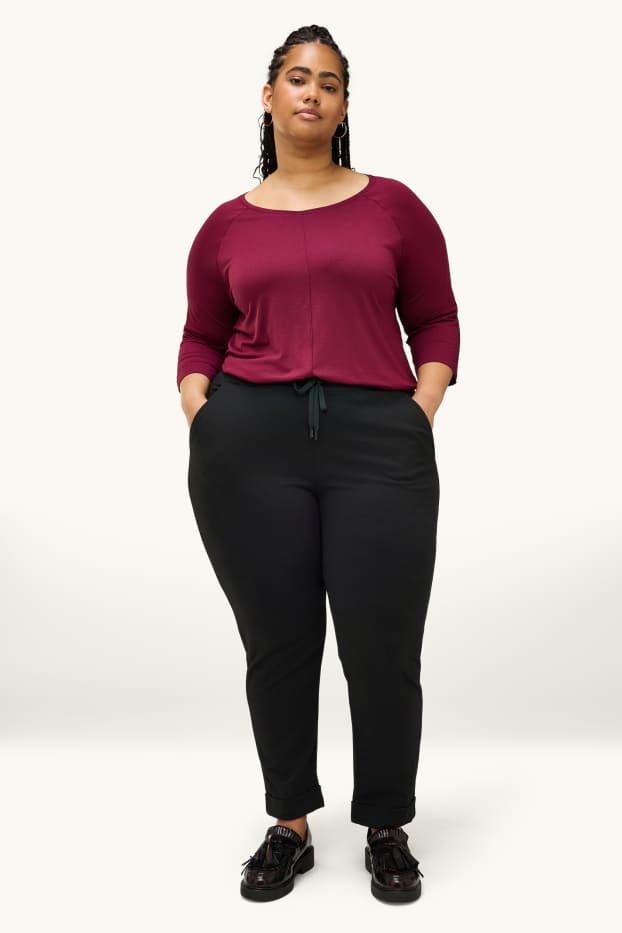 Femmes - Pantalon en toile - mid waist - tapered fit - noir