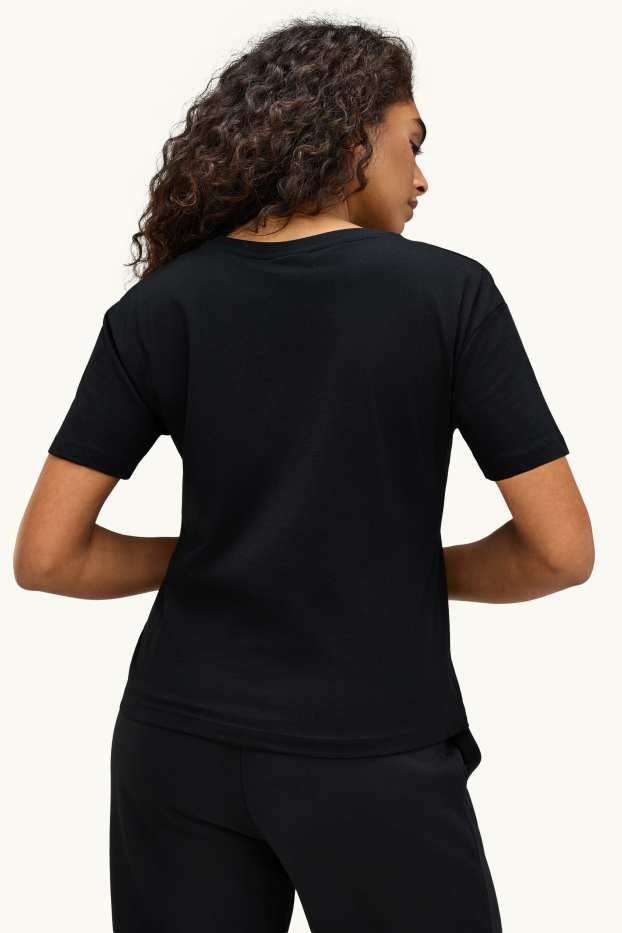 Dames - T-shirt - regular fit - Peanuts - zwart