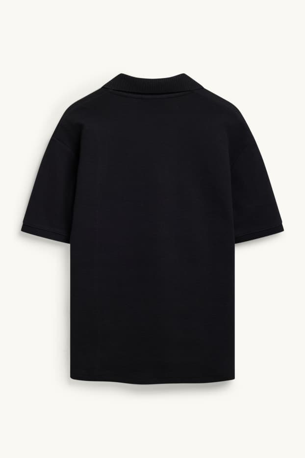 Hommes - Polo - relaxed fit - finition texturée - noir