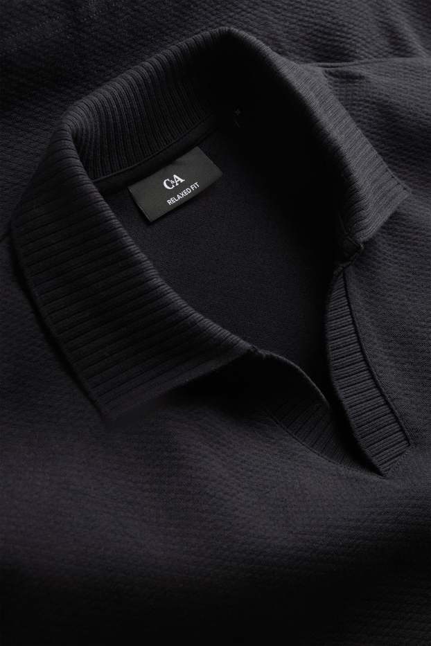 Hommes - Polo - relaxed fit - finition texturée - noir